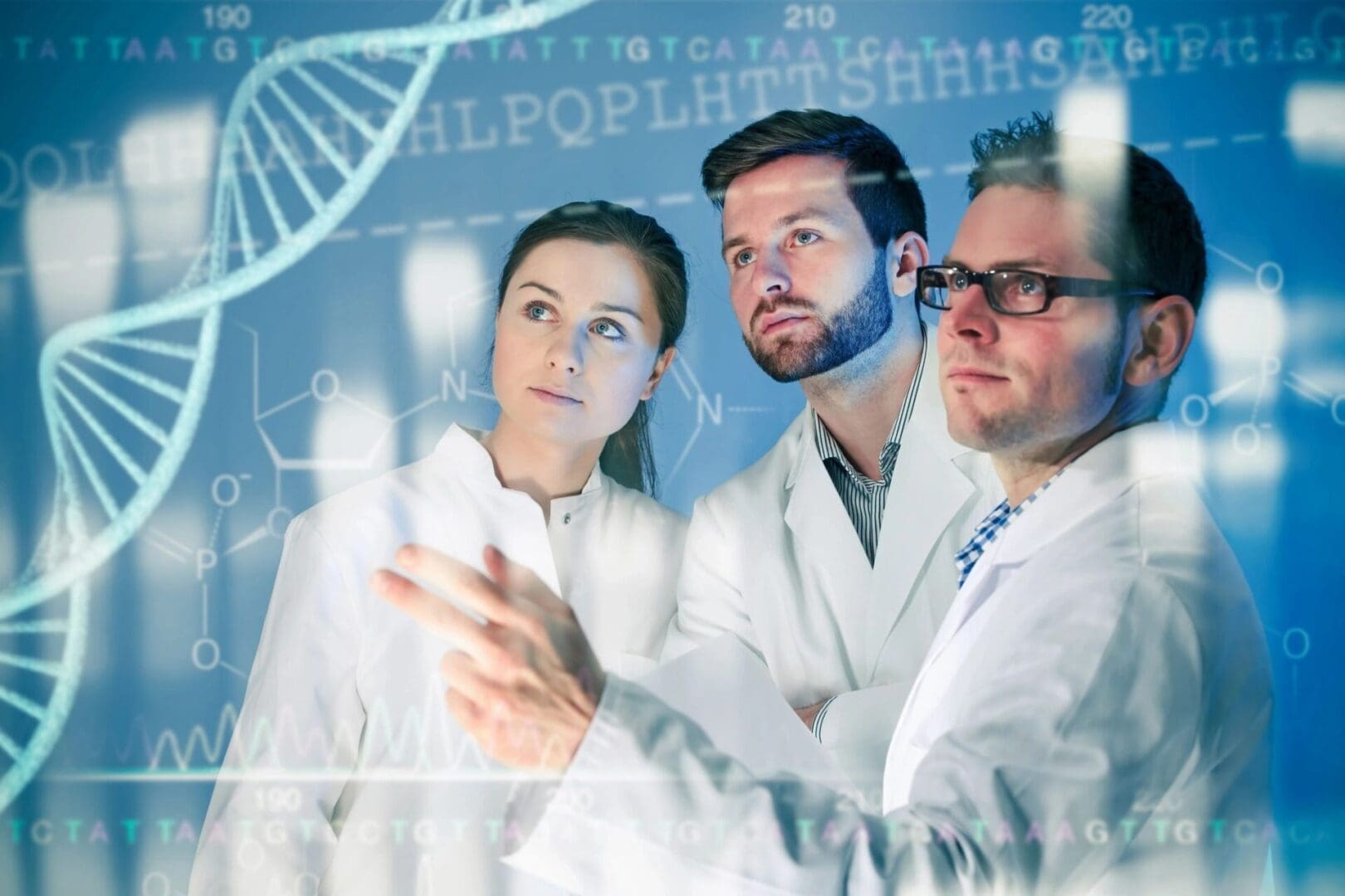 Three people in lab coats looking at a dna strand.